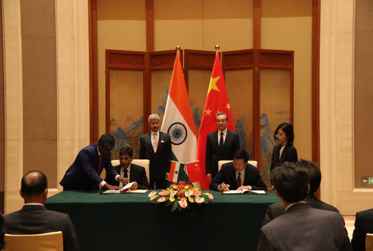 India and China signed four agreements to strengthen contacts between people of both countries