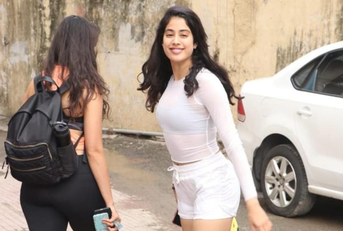 Janhvi Kapoor gym look in white tank top and pink jeggings