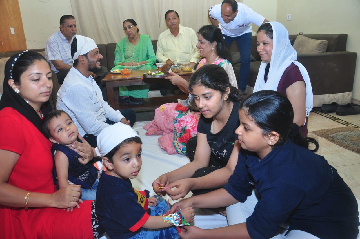 sisters tied rakhi on brothers wrist, prayed for their welbeing