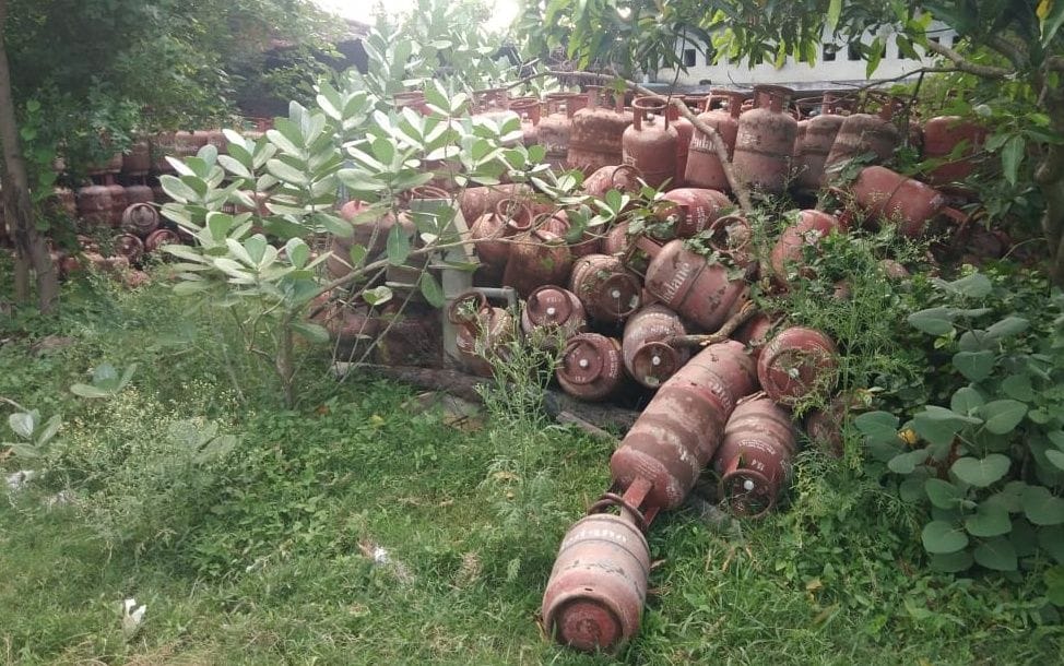 Hundreds of gas cylinders found in bushes behind gas agency