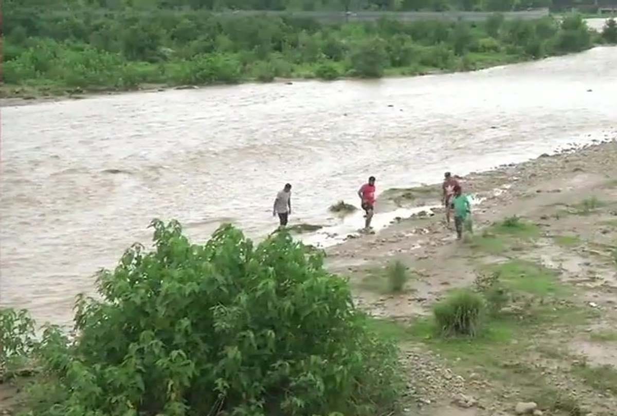 Two brothers swept away in river overflowing stream One rescued search for the other by SDRF