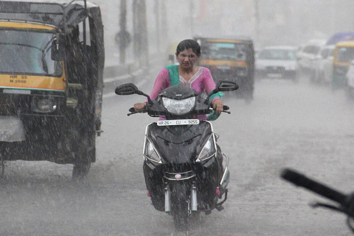 How to ride bike and scooter during rain all you need to know