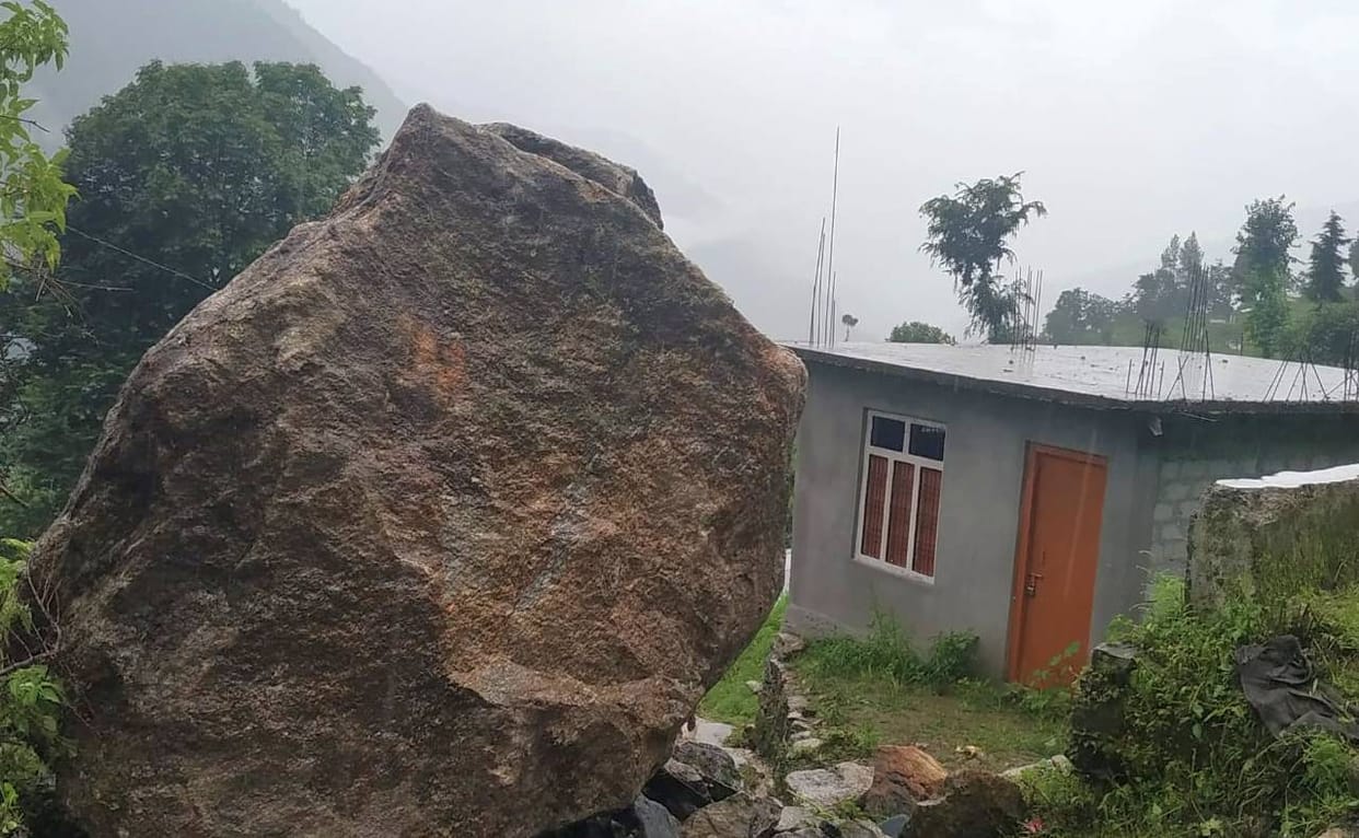 Boulder comes with debris from mountain in Dhapa village, villagers narrowly escaped