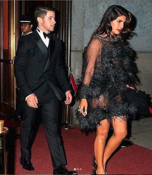 priyanka chopra reached in black dress with nick jonas at joe jonas birthday party