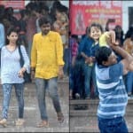 बारिश का लुत्फ उठाते लोग।