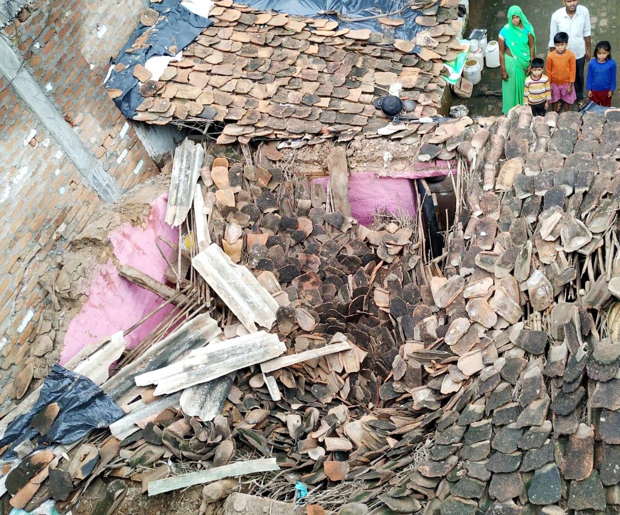 house collapsed due to rainfall
