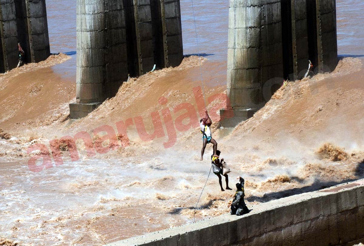 three persons have been rescued after they got stuck near a bridge in JAMMU in Tawi river