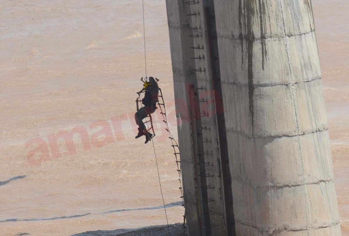 three persons have been rescued after they got stuck near a bridge in JAMMU in Tawi river