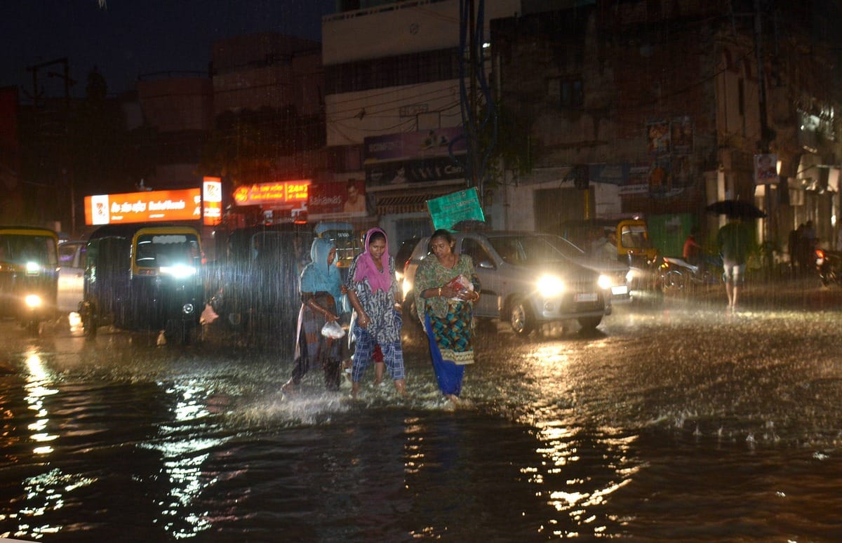 water logging on road shop traffic jam in varanasi