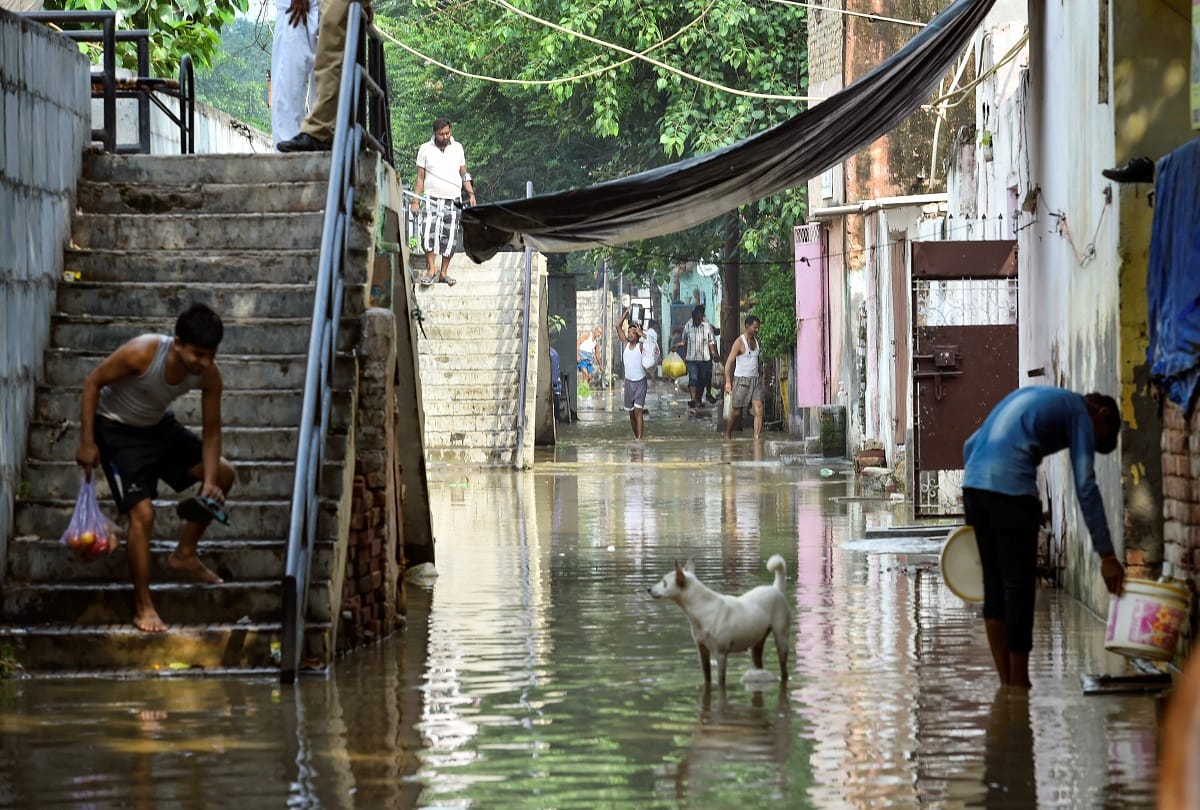 delhi najafgarh drain water level increased bridge building work stopped