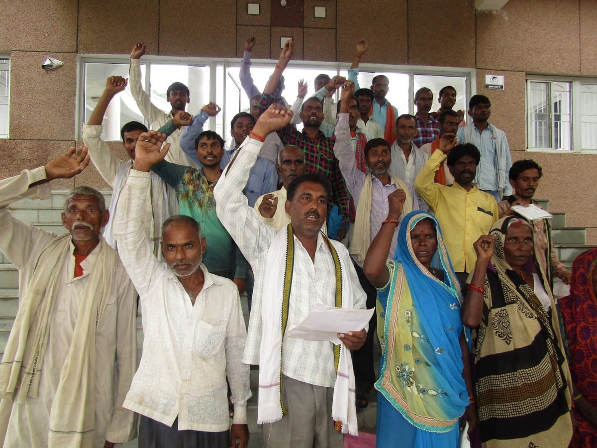 villagers protest in front of dm office for pradhan not live in village ghorawal sonbhadra