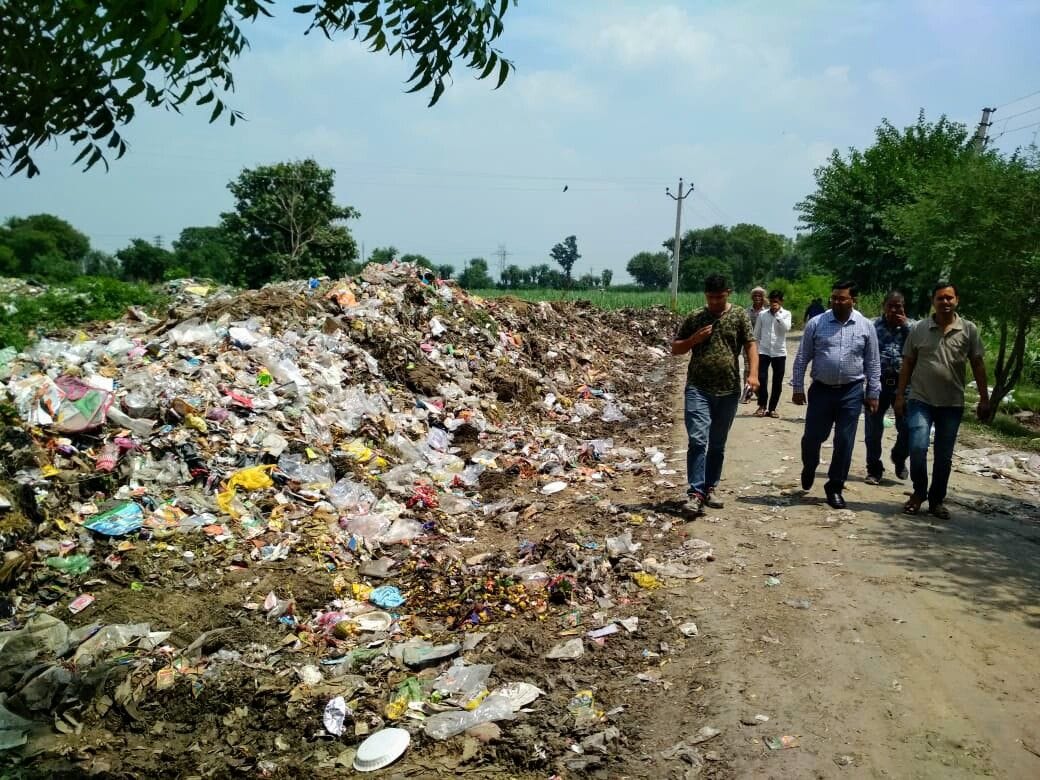 uproar aginst garbage infront of temple