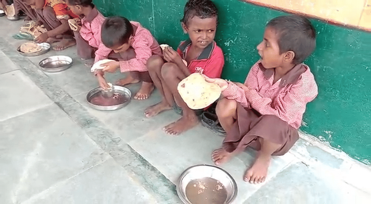 student children eat salt roti in mid day meal in govt school mirzapur