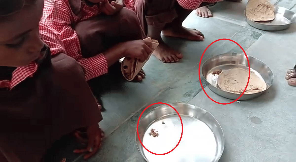 student children eat salt roti in mid day meal in govt school mirzapur