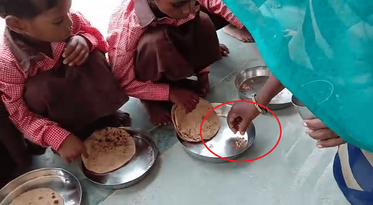 student children eat salt roti in mid day meal in govt school mirzapur