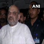 अमित शाह मीडिया को संबोधित करते हुए