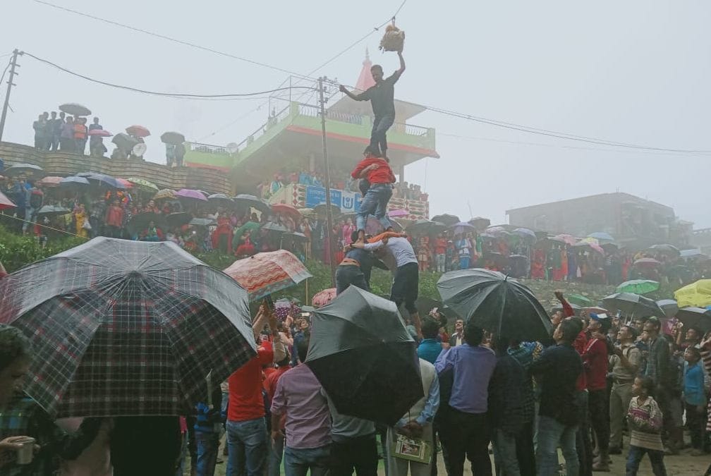 Govinda's team holds the pot at a height of 18 feet