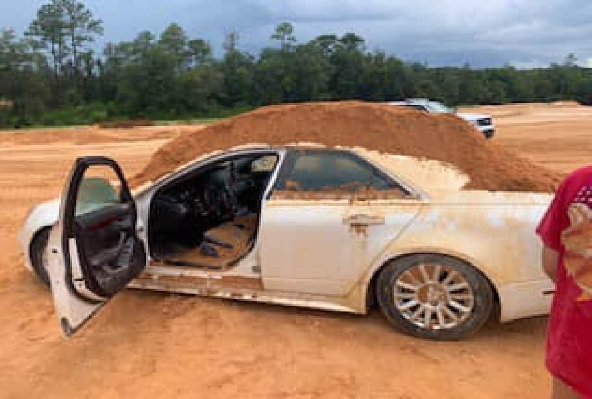 man arrested for dumping soil on car in florida