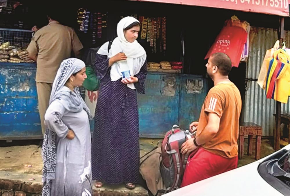 Kashmiri people come to meet their family members in Lucknow.