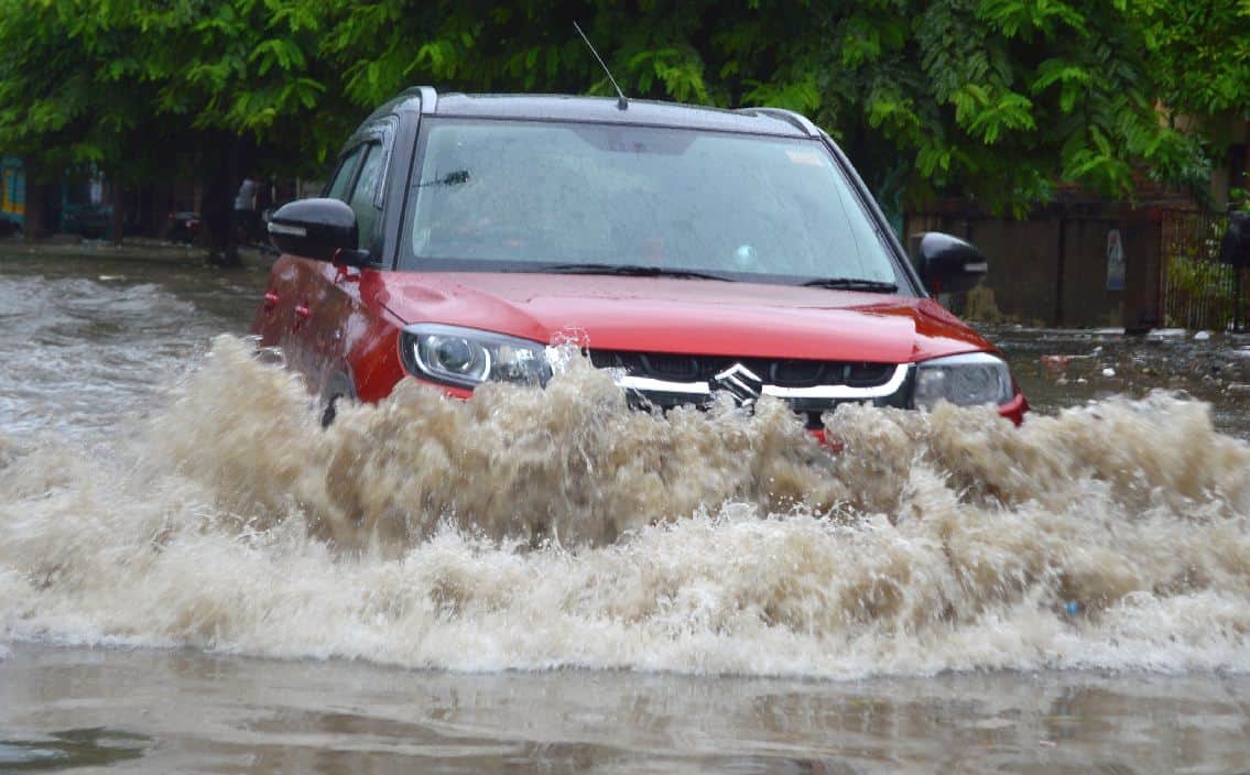 what to do if car stuck in water car care tips for monsoon car stuck in rain water car care tips for rainy season monsoon water logging in delhi water logging in gurgaon