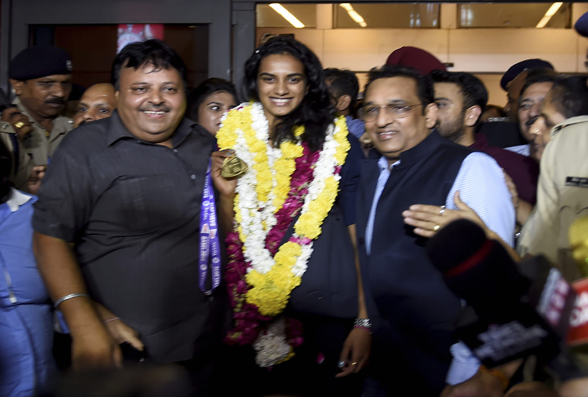 PV Sindhu return from Switzerland welcomed at IGI Airport people asking her for tokyo olympic