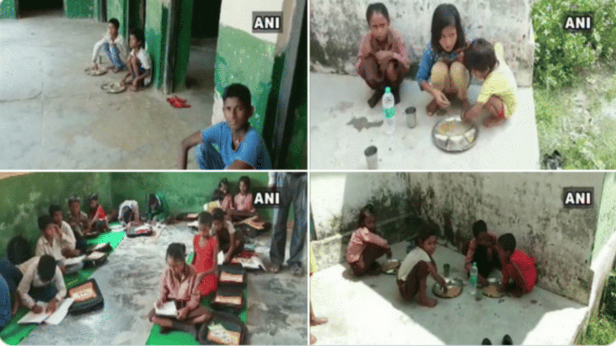 school children eating mid day meal in rampur ballia