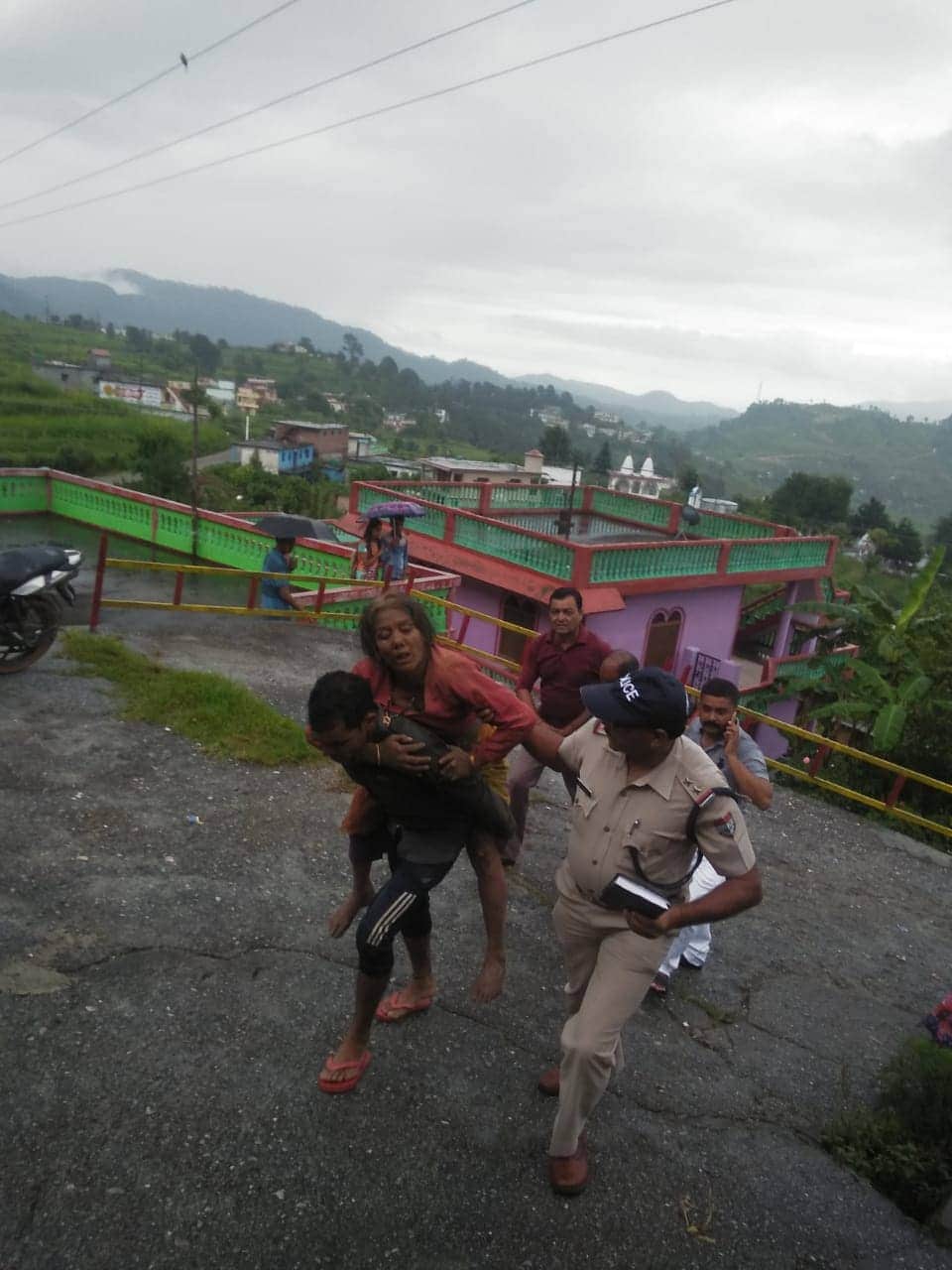 uttarakhand weather heavy rain rainy river overflow road swept