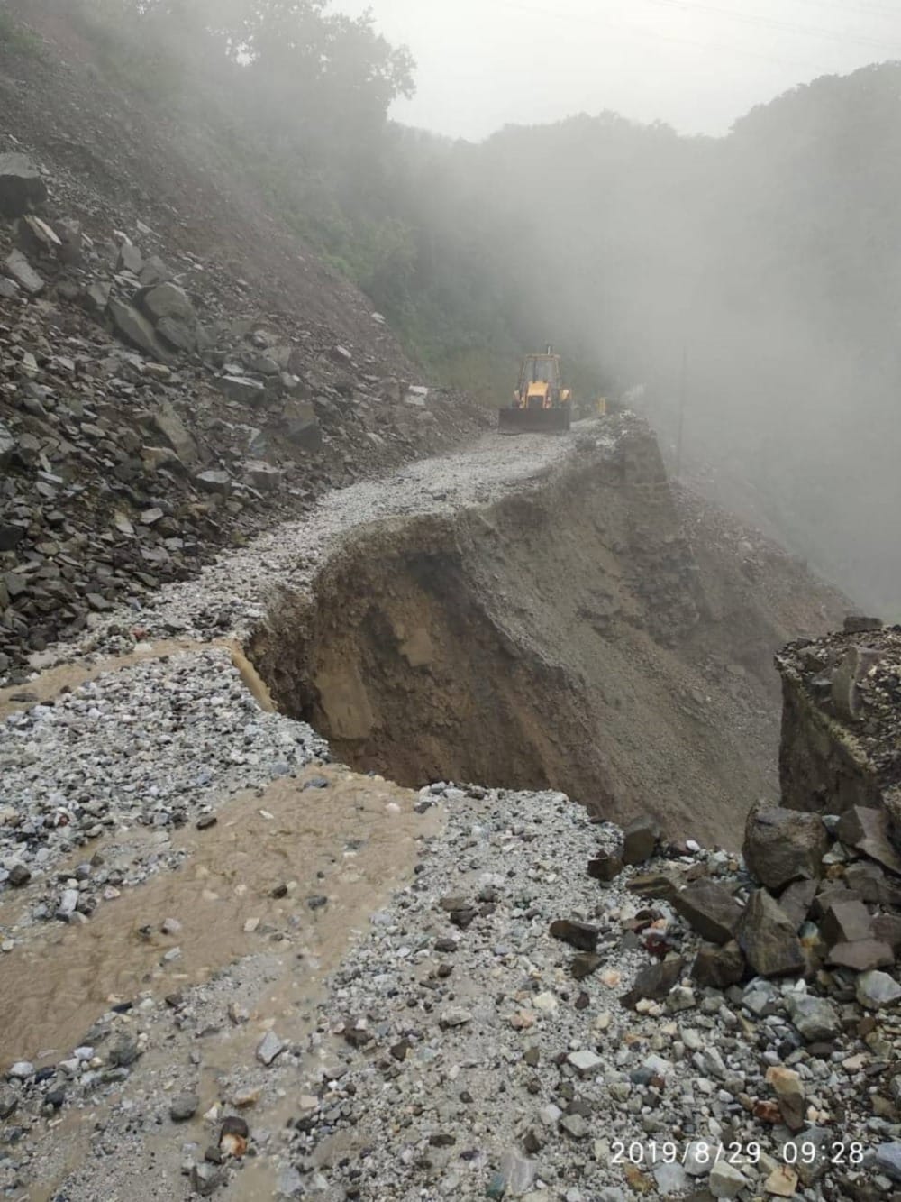 uttarakhand weather heavy rain rainy river overflow road swept