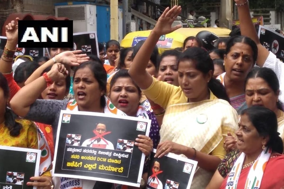 Congress workers protest against Deputy Chief Minister Laxman Savadi want him to out from cabinet