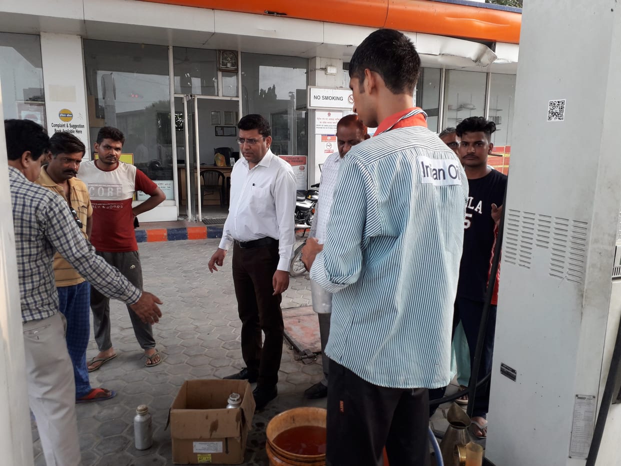 charge of adulteration of water in petrol
