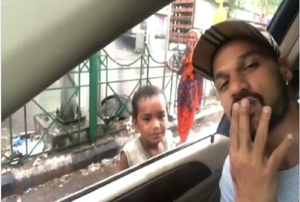 VIDEO: team india opener shikhar dhawan teaching boy how to give flying kisses 