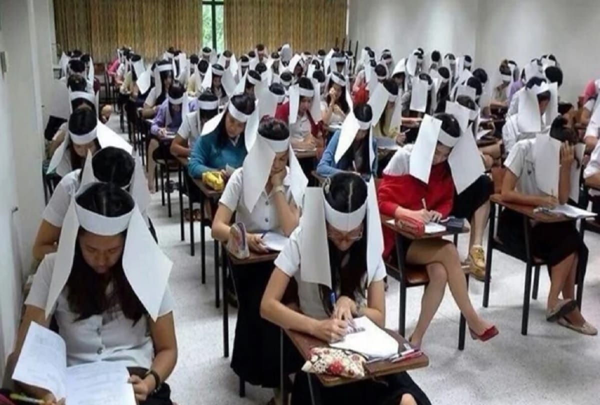 Teacher enrobe Cardboard Boxes to students to stop Cheating on Exam