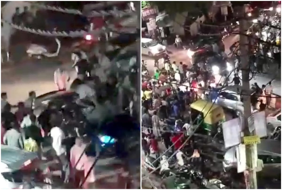 driver drive car on leg of a man in model town