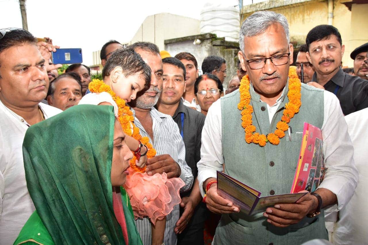 Malnutrition Eradication Campaign uttarakhand cm meet adopted girl