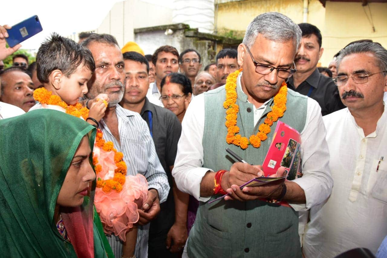 Malnutrition Eradication Campaign uttarakhand cm meet adopted girl