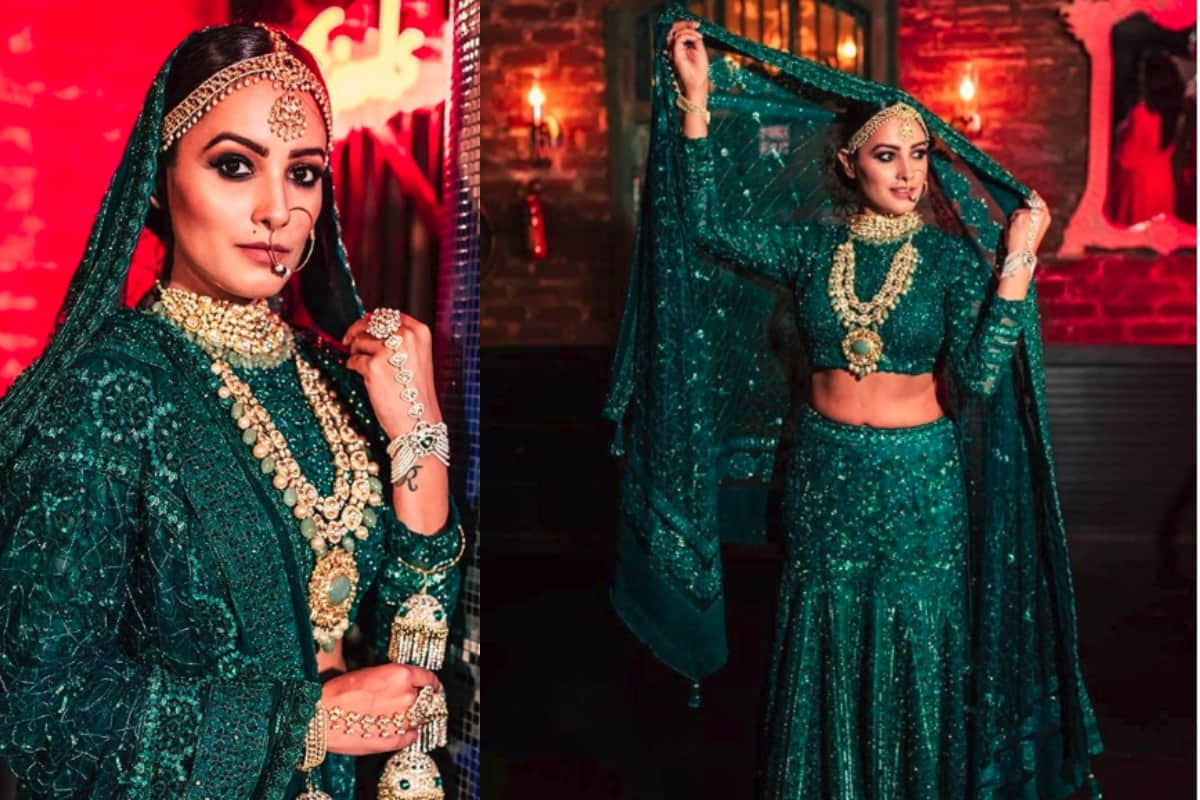 anita hassanandani stunning bridal look in dark green royal lehenga