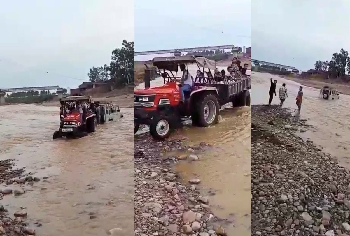 school students vehicle stuck in flooded khadd kangra himachal pradesh