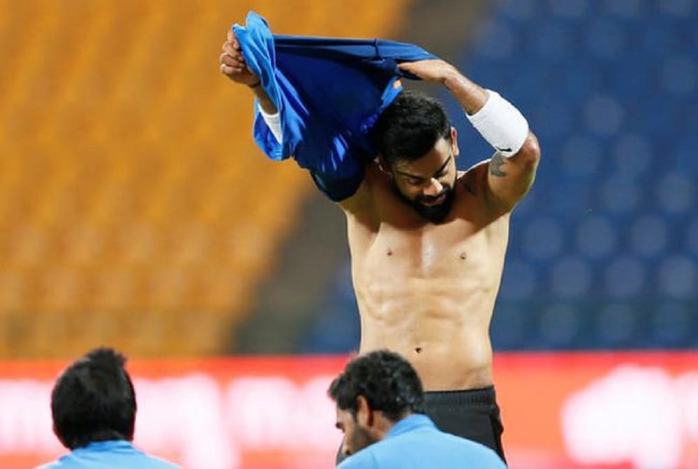 Virat Kohli Posts Topless Picture on social mdia, fans trolls