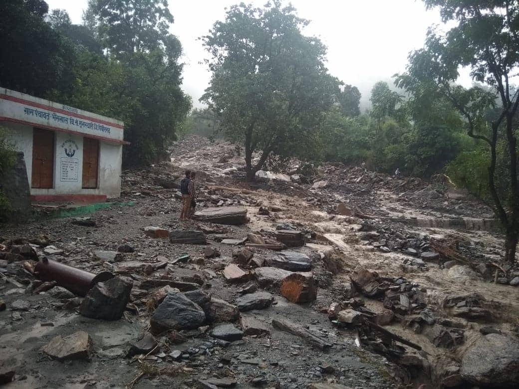 cloudburst caused havoc in Tharali, debris filled in the village photos
