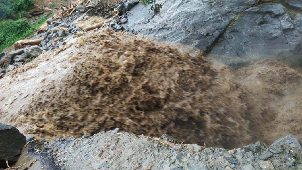 cloudburst caused havoc in Tharali, debris filled in the village photos