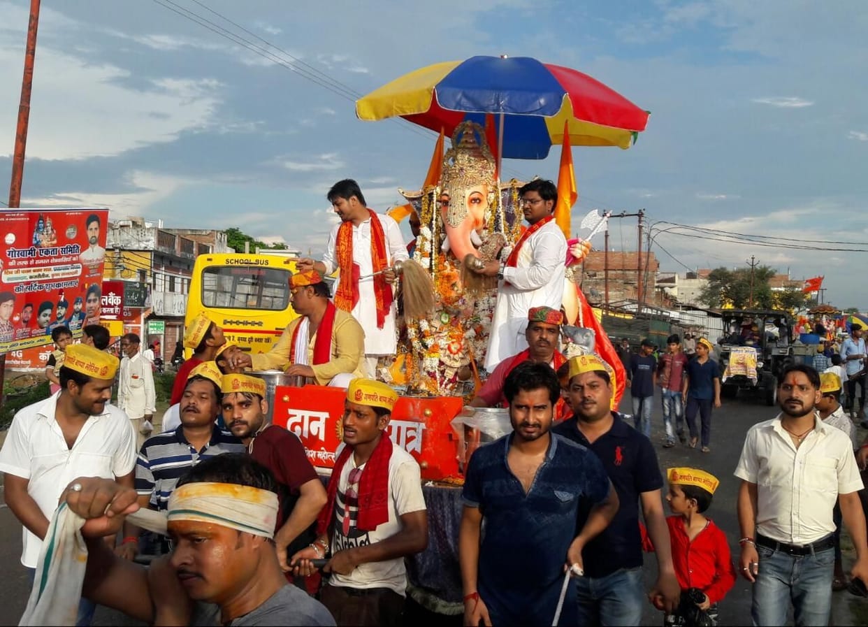 People gathered in procession of Bappa