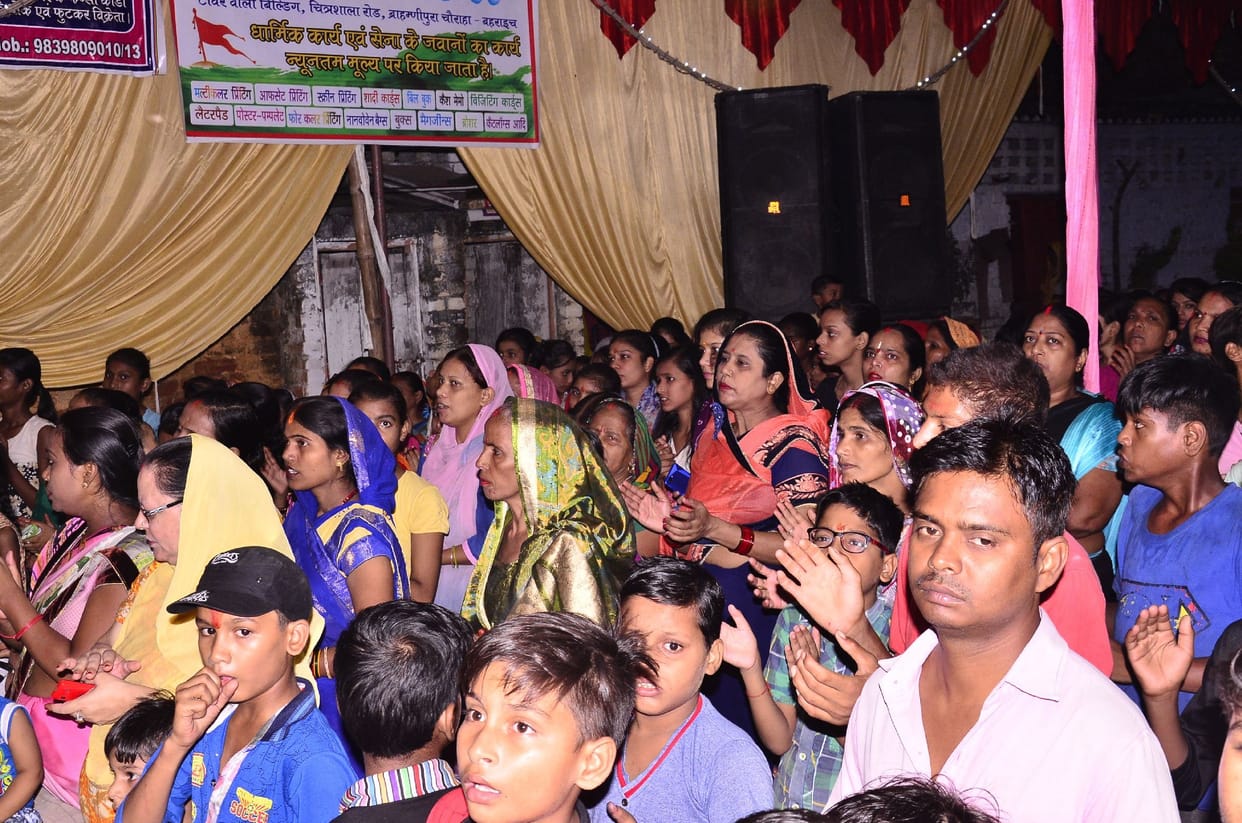 Worship of Gajanan in worship pandals, devotees gathered