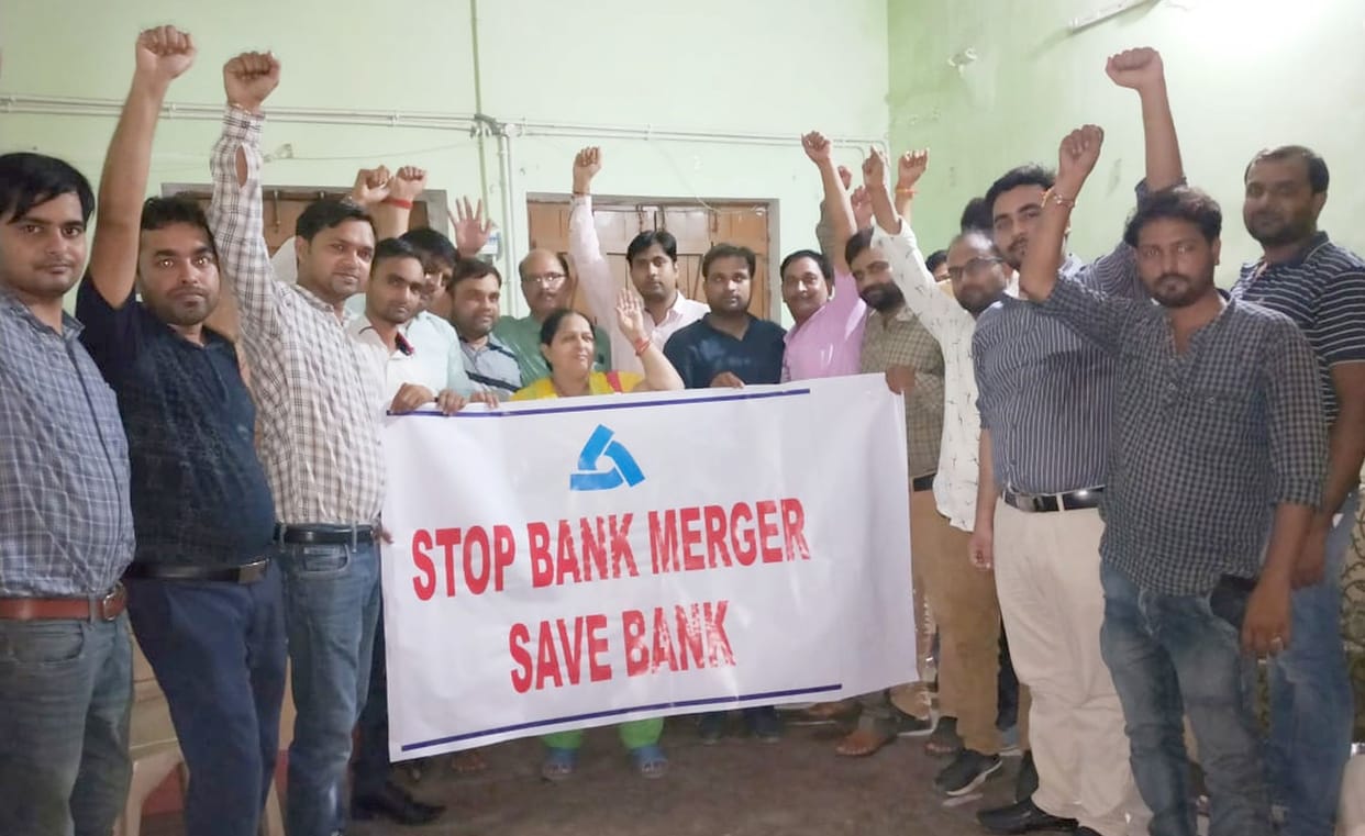 Banks merged to divert attention from the bad economy