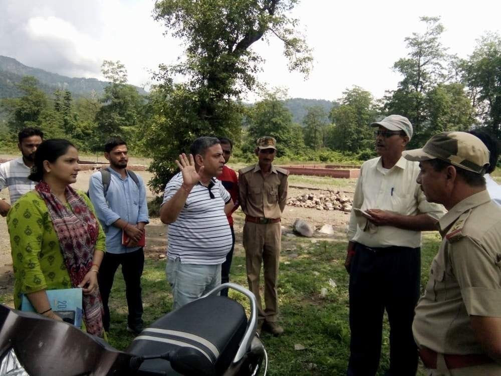 Teams survey the encroached land