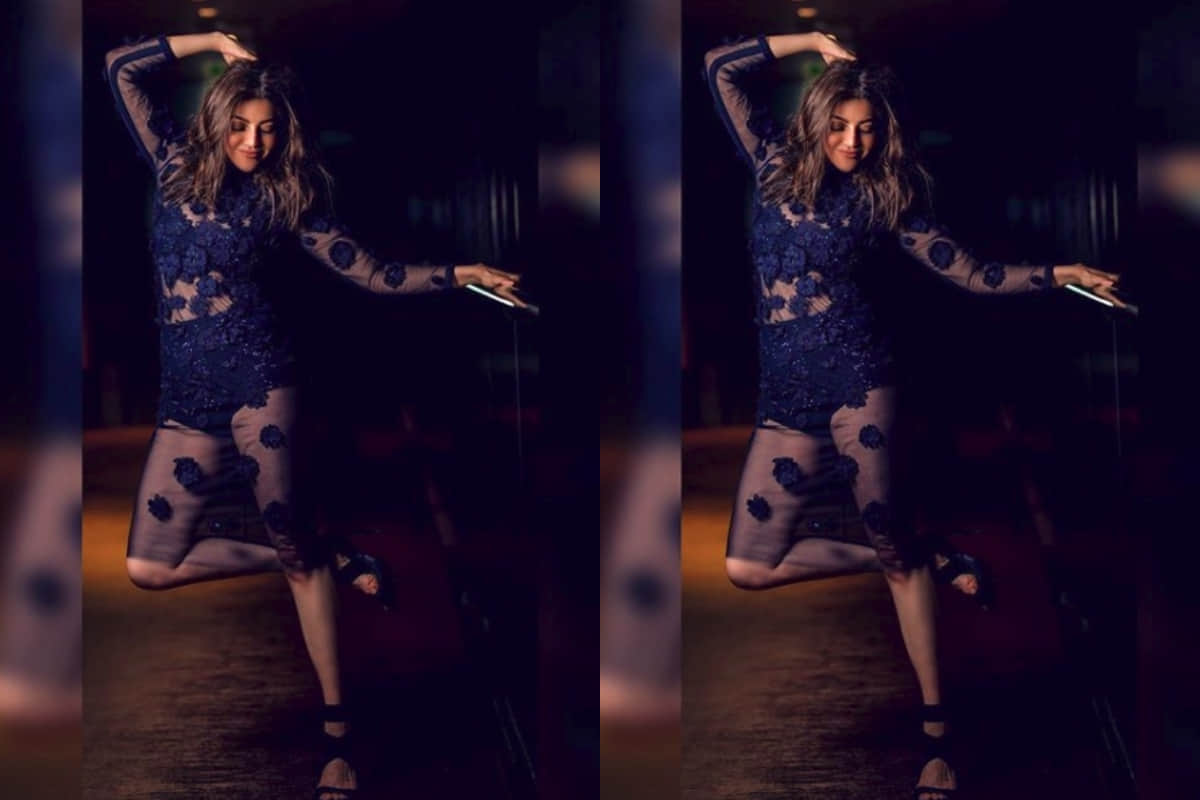 kajal aggarwal looks gorgeous in bold black avatar sheer bodycon dress