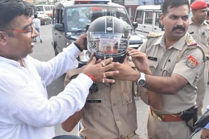 Meerut news, international cricketer karan sharma distributed helmets to people