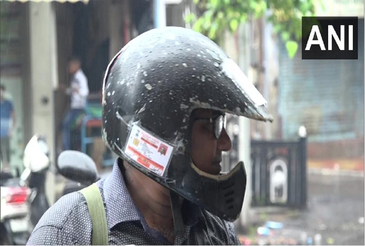 Vadodara resident R Shah passed his driving license RC insurance and other documents on his helmet