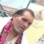 काशी विश्वनाथ का दर्शन करके लौटते खली।