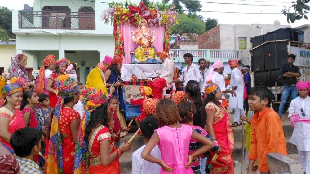Immersion of Ganesha idols with moist eyes with devotion, devotion