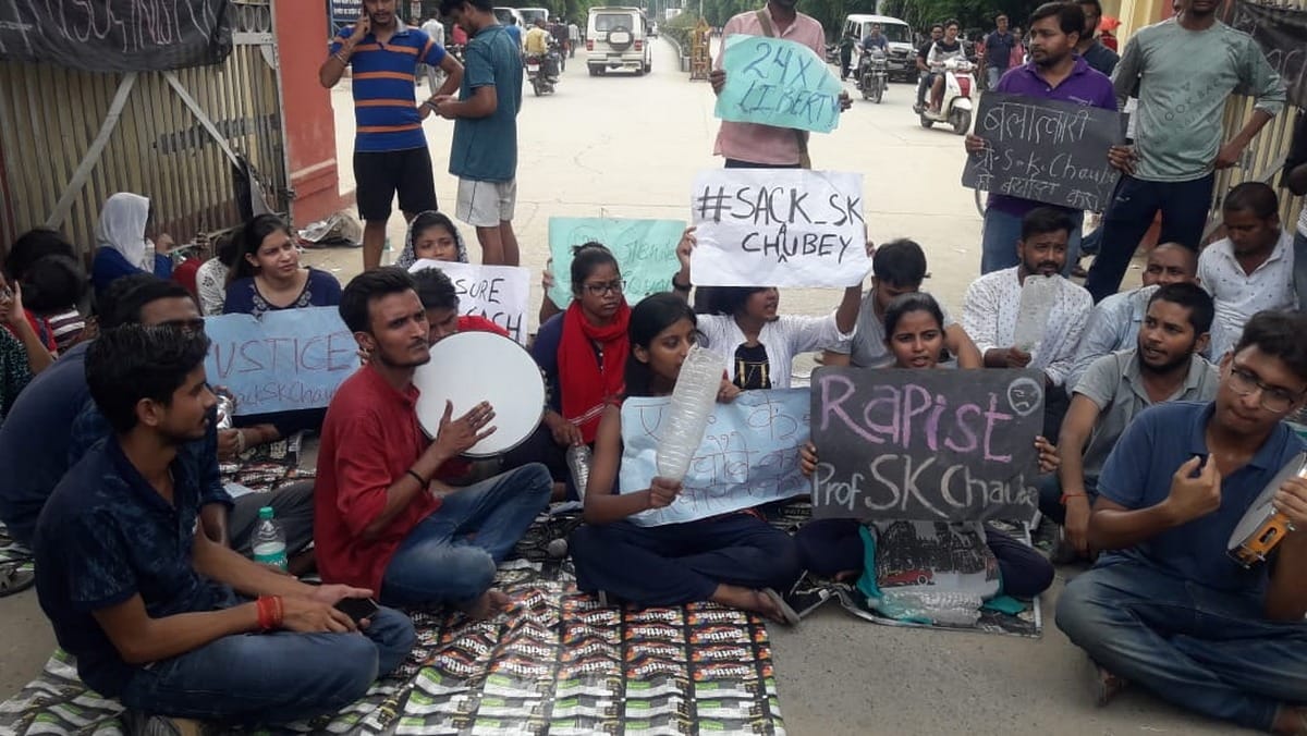BHU students strike on second day for dismissal of professor accused of molesting girl varanasi